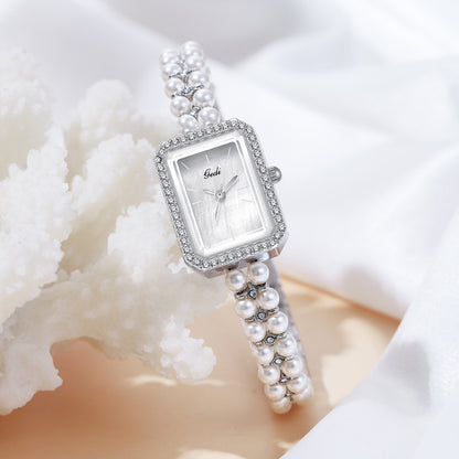 Montre à quartz créative pour femme avec perles de coquillage